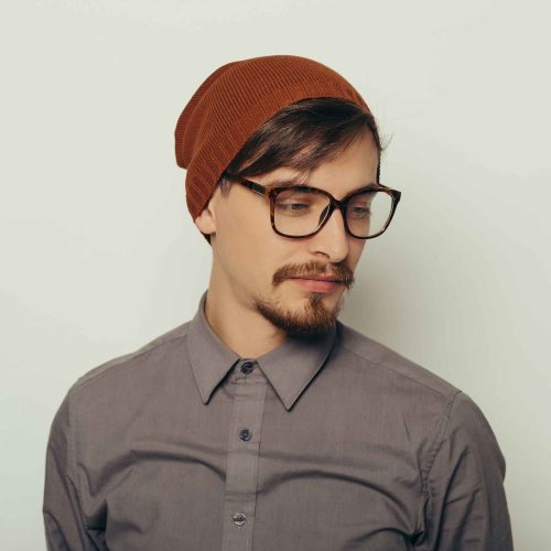 portrait-of-an-interesting-young-man-in-winter-clo-PTK6576-1-1.jpg